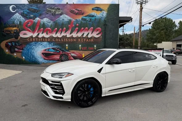 Finished white Lamborghini photographed at Showtime Collision